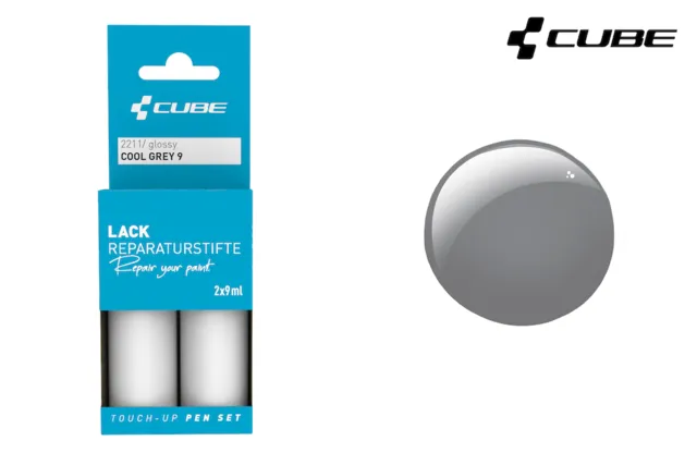 Die Verpackung des CUBE Lackstift-Sets in kühlem Grau enthält zwei kleine Fläschchen und ein rundes, glänzend graues Farbmuster. Das CUBE Fahrrad-Logo erscheint oben rechts auf weißem Hintergrund und würdigt damit die Lichtenfelser Tradition der Marke.