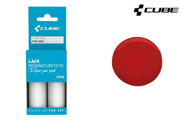 Das CUBE Lackstift Set FIRE RED matt 2148 kommt in einer blauen Verpackung mit zwei kleinen Fläschchen, einem roten Farbmuster und dem schwarzen CUBE-Logo - ideal für Fans von Mr. Bike Lichtenfels, die präzise Lackierungen wünschen.