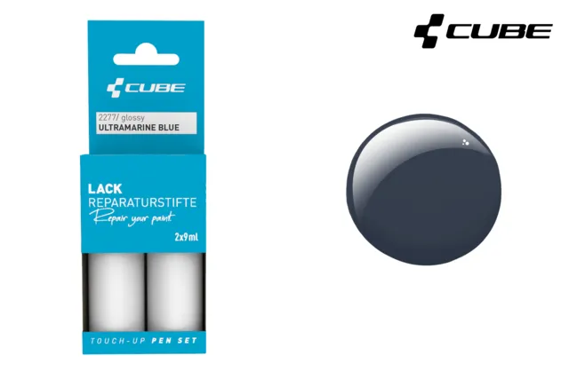 Die Verpackung für das CUBE Lackstift Set ULTRAMARINE BLUE glossy 2277 zeigt zwei 12ml Stifte mit der Aufschrift CUBE in Ultramarinblau, mit einem dunkelblauen glänzenden Muster und dem Mr. Bike Lichtenfels CUBE Logo in der oberen rechten Ecke.